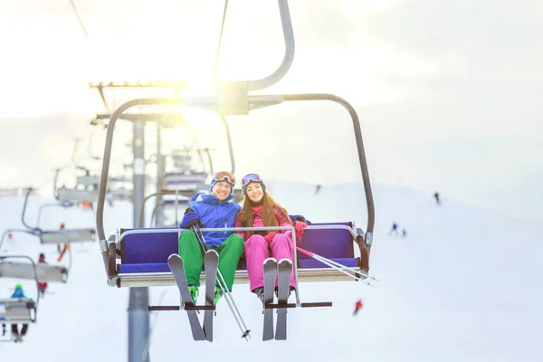 Young couple with skis Stock Picture