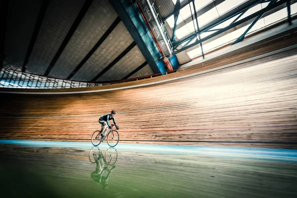 Racing cyclist indoors — Stock Photo, Image