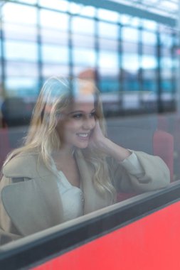 Happy girl in a train