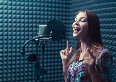 Woman in a recording studio