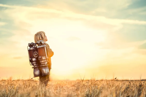 Boy at sunset — Stock Photo, Image