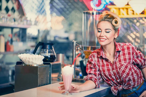 Pin-up girl in cafe — Stock Photo, Image