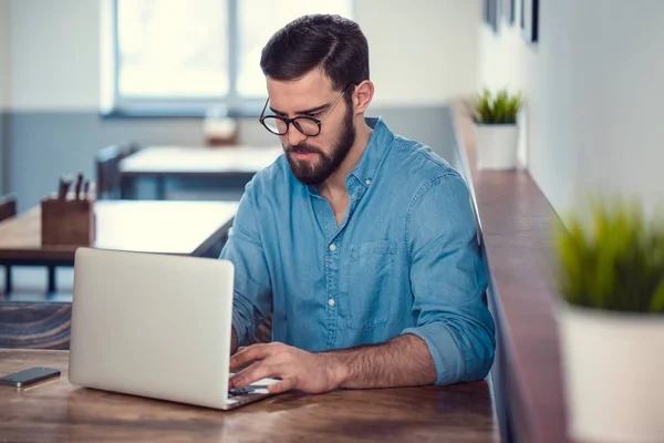 Young man in cafe — Stock Photo, Image