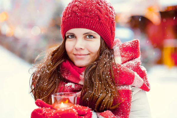 Young woman with a candle — Stock Photo, Image