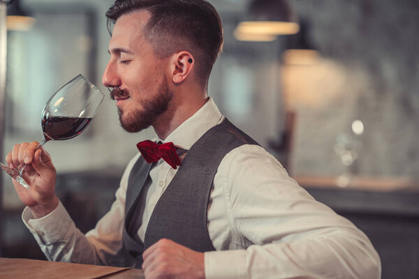 Man tasting wine