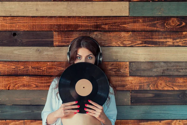 Woman with a phonograph record — Stock Photo, Image