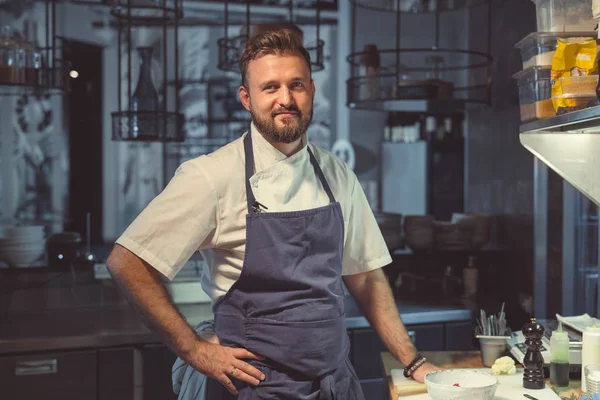 Smiling young cook — Stock Photo, Image