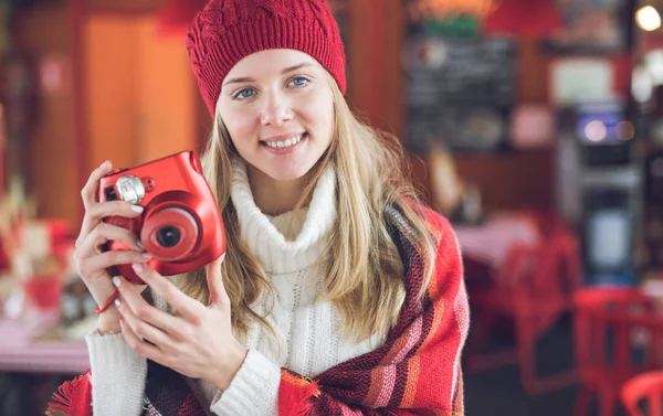 Young girl with polaroid — Stock Photo, Image