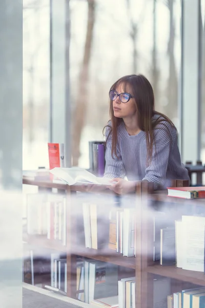 Young woman with books — Stock Photo, Image