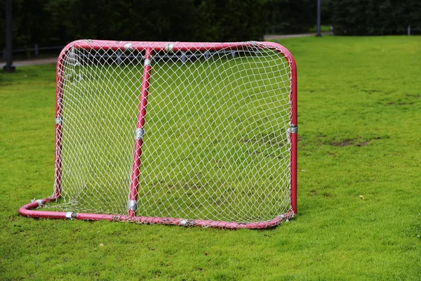 Red soccer goal at the playground — Stock Photo, Image