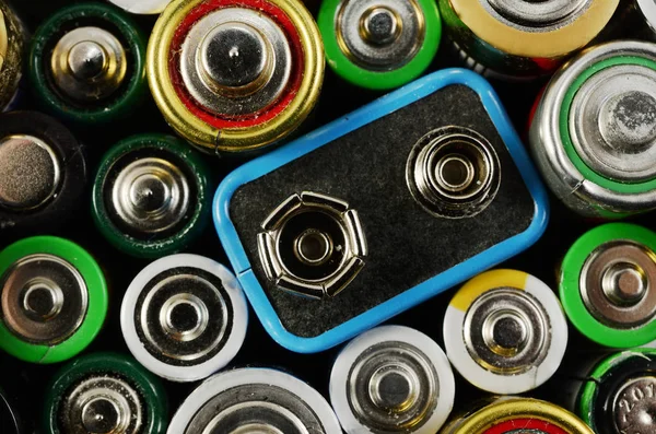 Lot of old used batteries — Stock Photo, Image