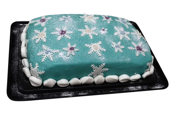 Bolo de Natal com flocos de neve em um branco — Fotografia de Stock