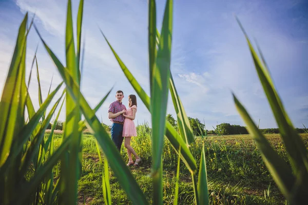 Young couple in love together on nature — Stock Photo, Image