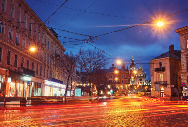 Mysterious narrow alley with lanterns in an old European city