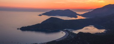 Ölüdeniz manzara güzel günbatımı lagoon Beach, Türkiye'de Deniz Manzaralı.