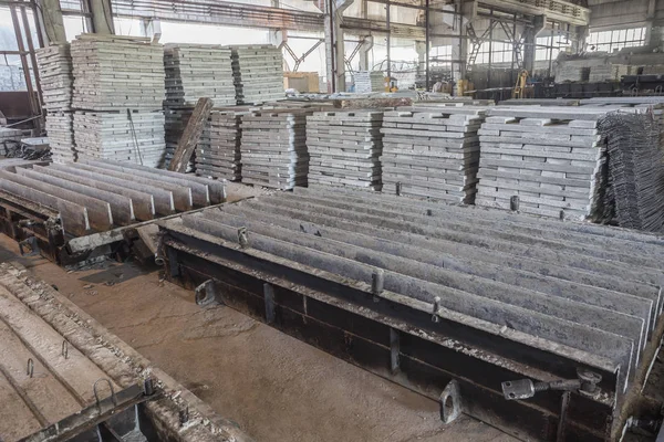 stock image Stack of precast reinforced concrete slabs in a house-building factory