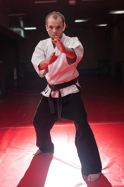 Fighter Tightening Karate Belt Dark Background — Stock Photo, Image