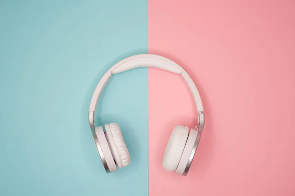 White Wireless Headphones Pink Blue Pastel Background Divided Two Halves — Stock Photo, Image