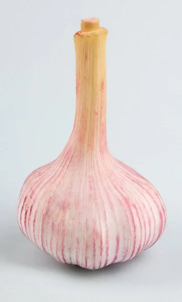 Knoblauch auf grünem Hintergrund — Stockfoto