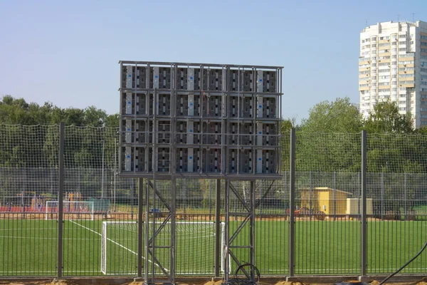 Campo de futebol perto de cerca no dia ensolarado — Fotografia de Stock