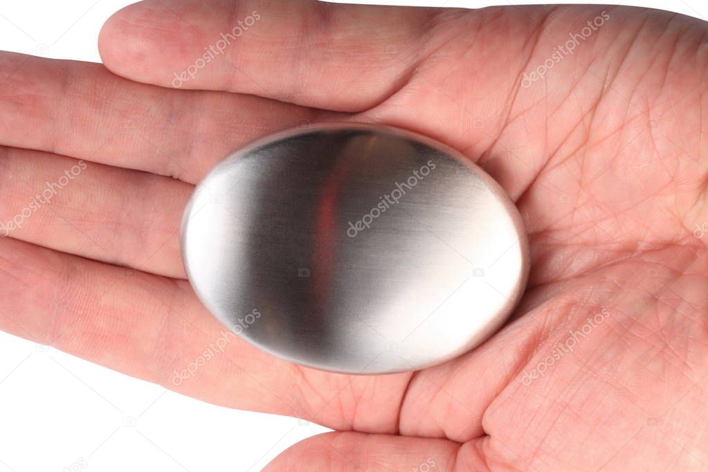 hand with Stainless Steel Soap isolated on white background 
