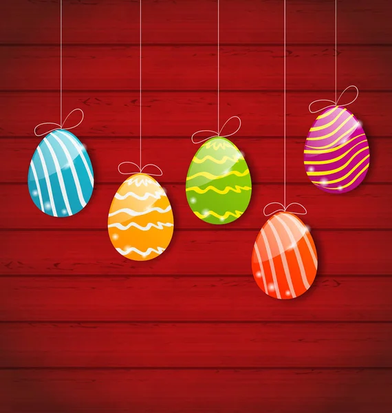 Easter three ornamental colorful eggs on wooden background — Stock Photo, Image