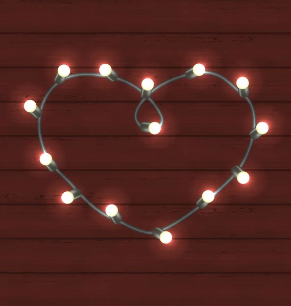 Guirnalda en forma de corazón sobre fondo de madera para San Valentín —  Fotos de Stock