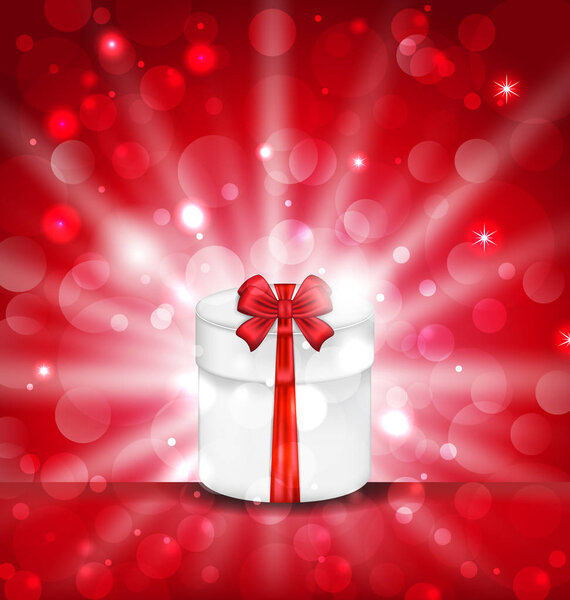 Round gift box on light red background with glow