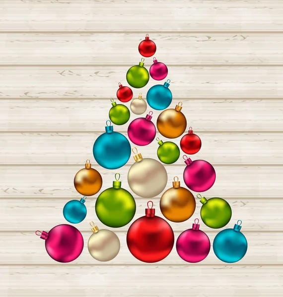 Julgran av färgglada bollar på trä bakgrund — Stockfoto
