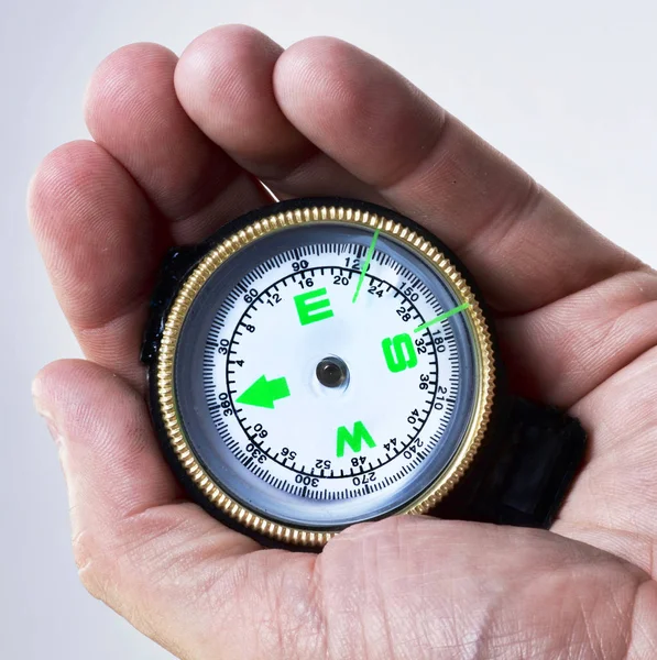 Compass in hand — Stock Photo, Image