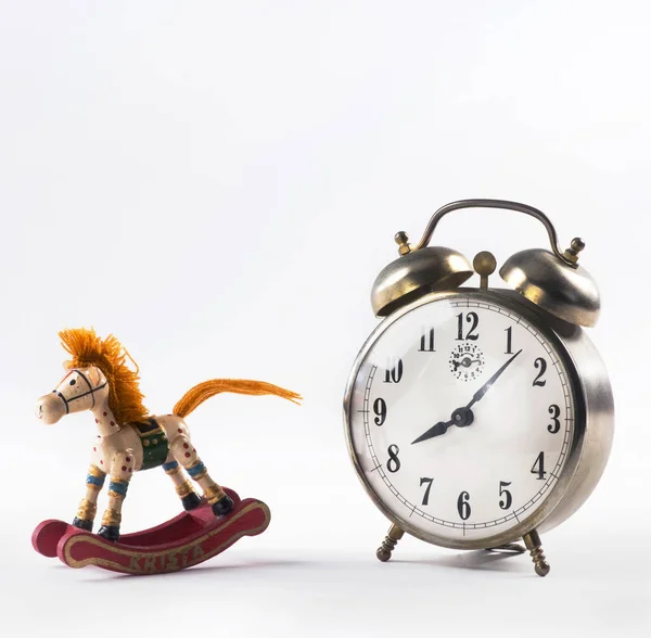 Rocking Horse and Alarm Clock. — Stock Photo, Image