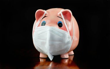 Virüs salgını için N95 yüz maskeli Piggy Bank.