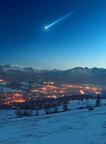 Shooting star over the city Zakopane - Poland