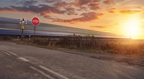 train running towards the sun