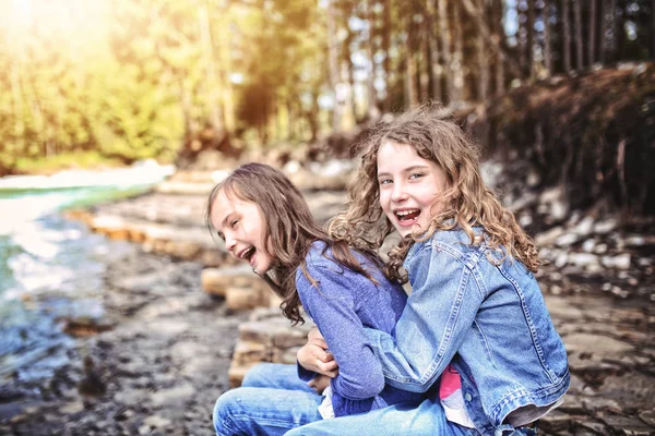 Laughing young girls outside — Stock Photo, Image