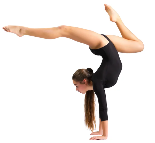 Young girl doing gymnastic exercises — Stock Photo, Image