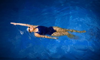 Young woman swimmer clipart