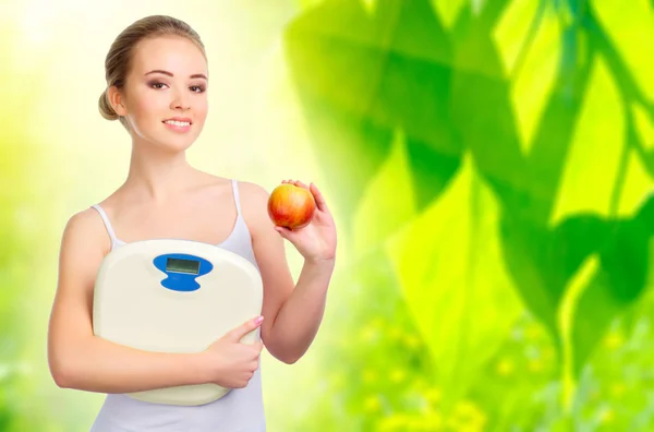 Young healthy woman on floral background — Stock Photo, Image