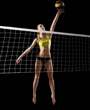 Kız plaj voleybol oyuncu (ver topu ve net ile)