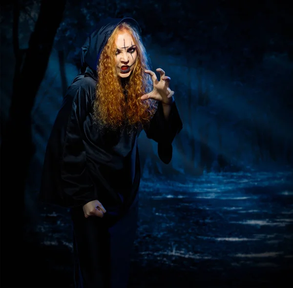 Witch in night forest — Stock Photo, Image