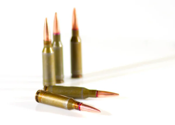 Ammunition cartridges on white — Stock Photo, Image