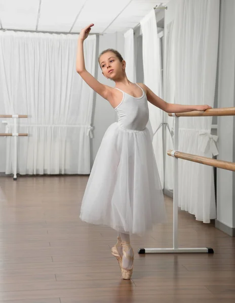 Little girl classic ballet dancer in studio