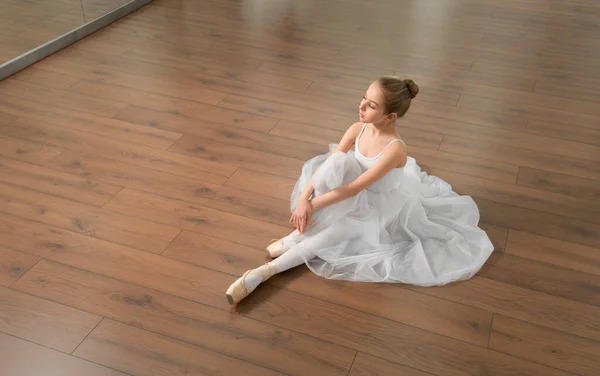 Little girl classic ballet dancer in studio