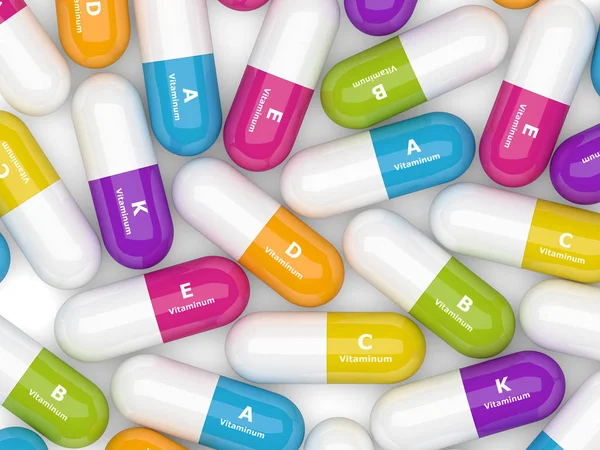 3d rendering of vitamin pills over white — Stock Photo, Image