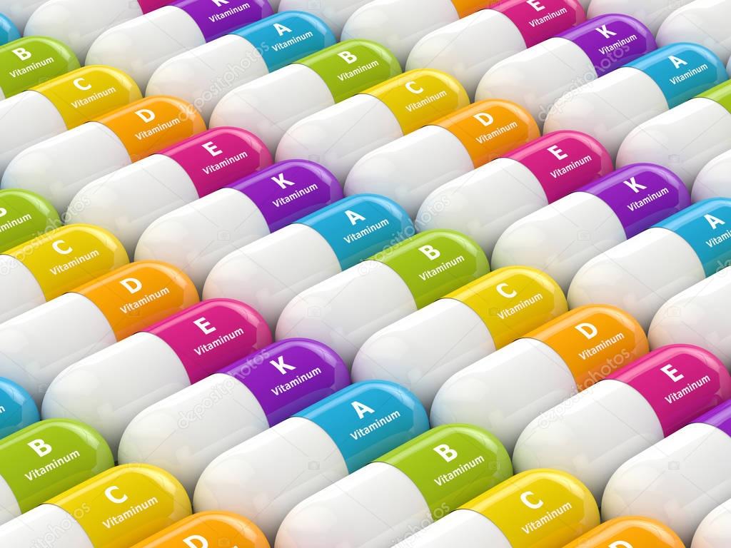 3d rendering of vitamin pills in row