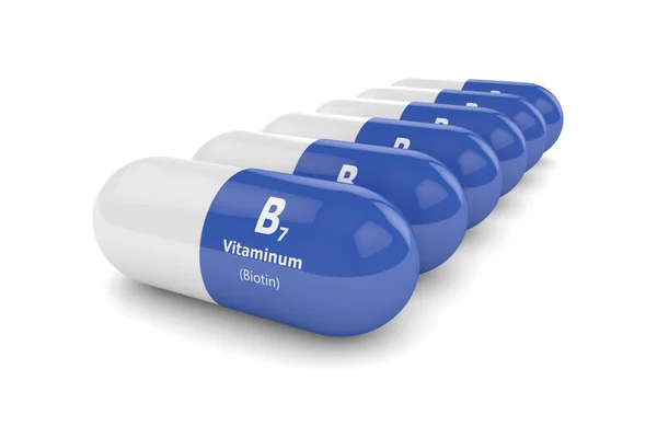 3d representación de las píldoras de vitamina B7 en fila — Foto de Stock