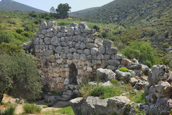 Remains of defense wall in ancient Greek town Mycenae