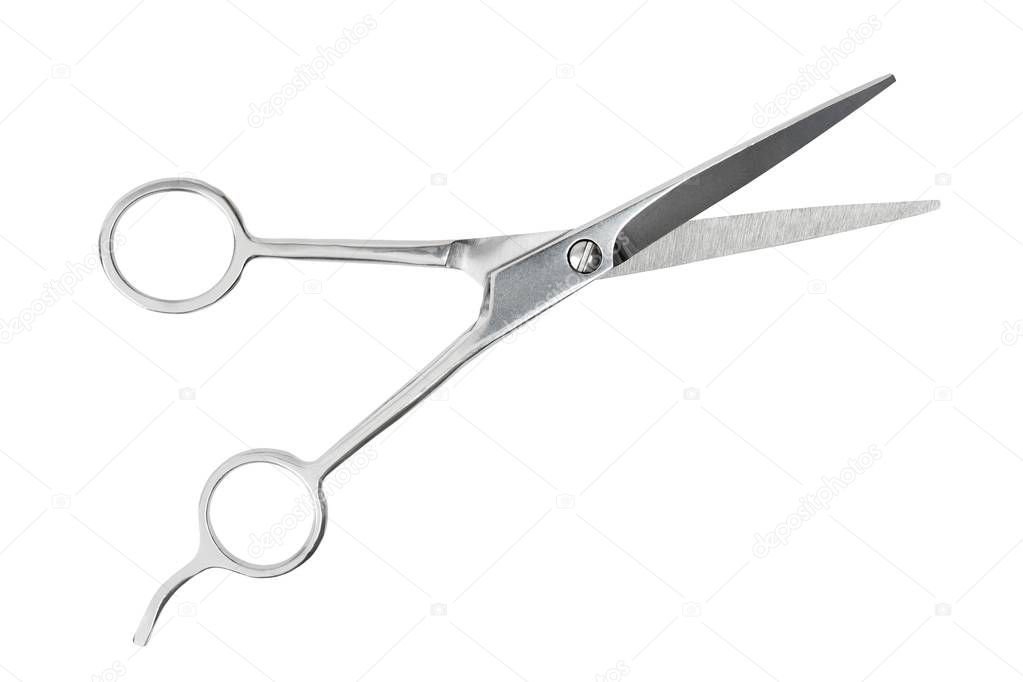 Barber scissors on white