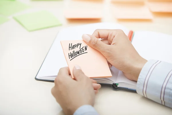 Happy Halloween agenda in handen — Stockfoto