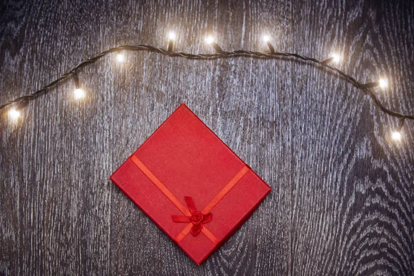 Luz de Natal e caixa de presente — Fotografia de Stock